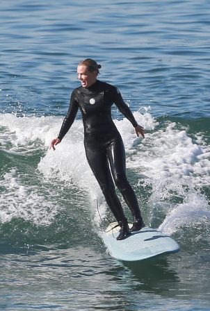 Lara Bingle - Surfing candids in Malibu