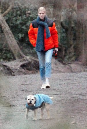 Lara Stone - Out with her dog