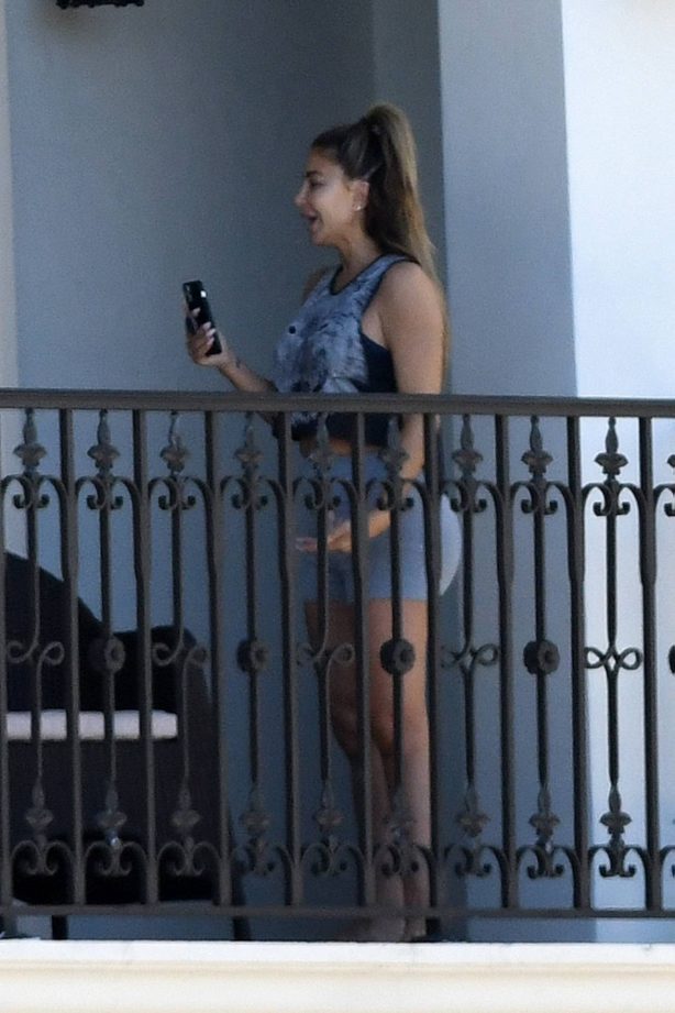 Larsa Pippen - Chats on the phone on her balcony in Ft. Lauderdale