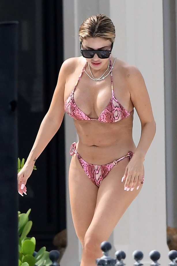 Larsa Pippen - In a pink snakeskin bikini in Ft. Lauderdale