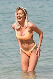 Laura Anderson in Peach Bikini on the beach in Dubai