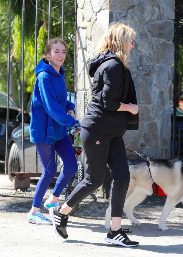 Laura Dern - Takes her daughter and dogs for a walk in LA
