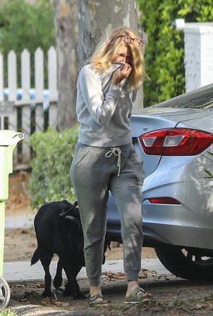 Laura Dern - Taking her dog out for a quick walk in Pacific Palisades
