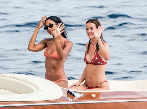 Laura Harrier and Eleonore Toulin in Bikini at a boat in Positano