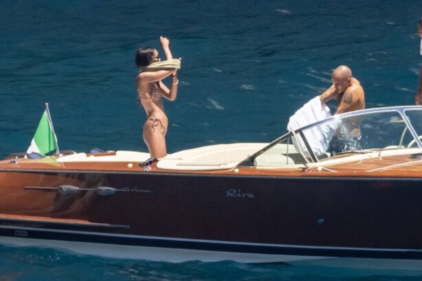 Laura Harrier - In a bikini on a boat with new beau Sam Jarou in Positano