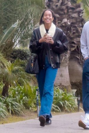 Laura Harrier - In a leather jacket with a male friend in Los Feliz