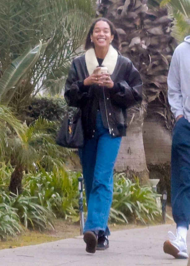 Laura Harrier - In a leather jacket with a male friend in Los Feliz