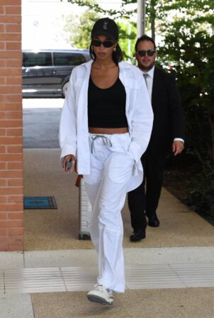 Laura Harrier - In a white tracksuit arriving at Venice Film Festival