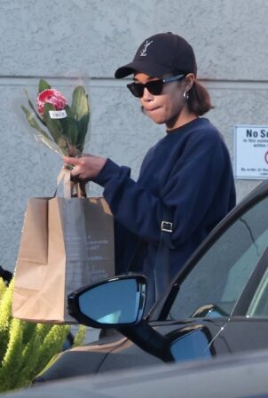 Laura Harrier - Leaving Gelson's with some flowers in Los Feliz