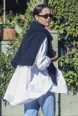 Laura Harrier - With Sam Jarou on a walk with their dog in L.A