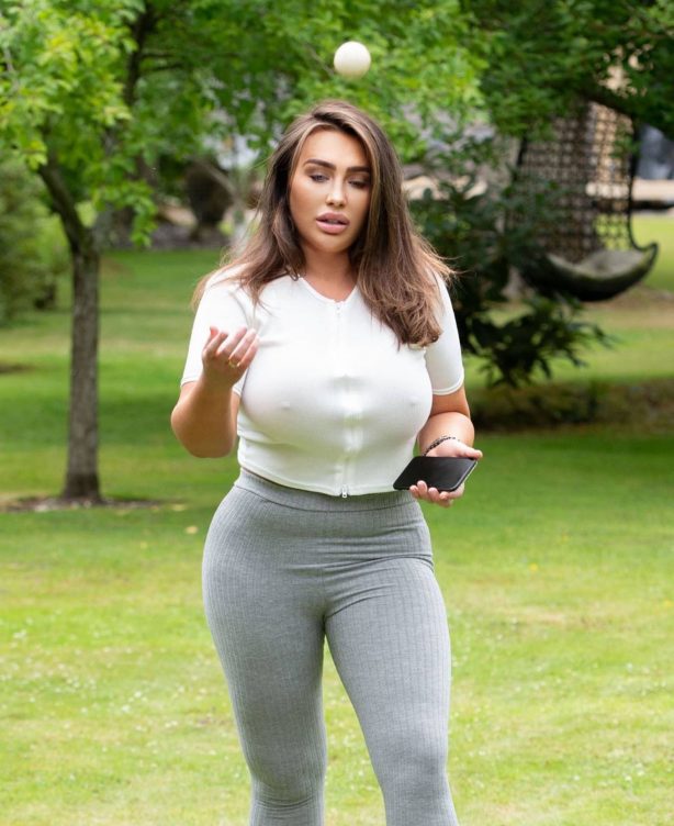 Lauren Goodger - Pictured while playing with a Dachshund in a park in Essex