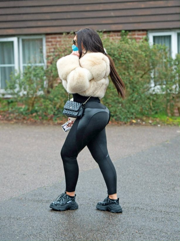 Lauren Goodger - Wearing black leggings, trainers and a fur coat