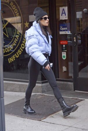 Lea Michele - In a purple bomber bubble jacket arriving on 'Funny Girl' in New York