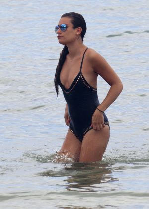 Lea Michele in Black Swimsuit on a beach in Maui