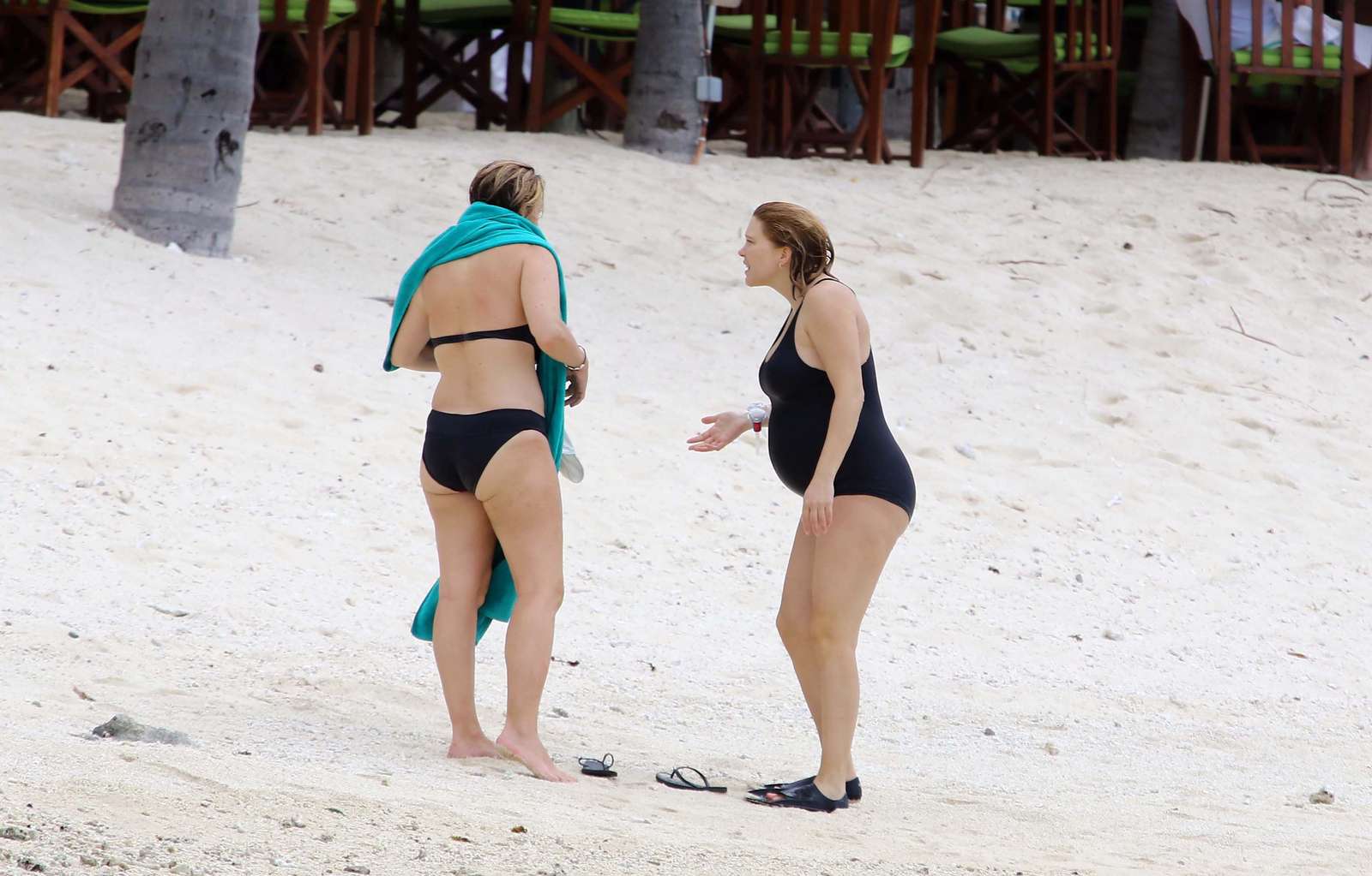 Lea Seydoux in Black Swimsuit at the beach in Mauritius. 