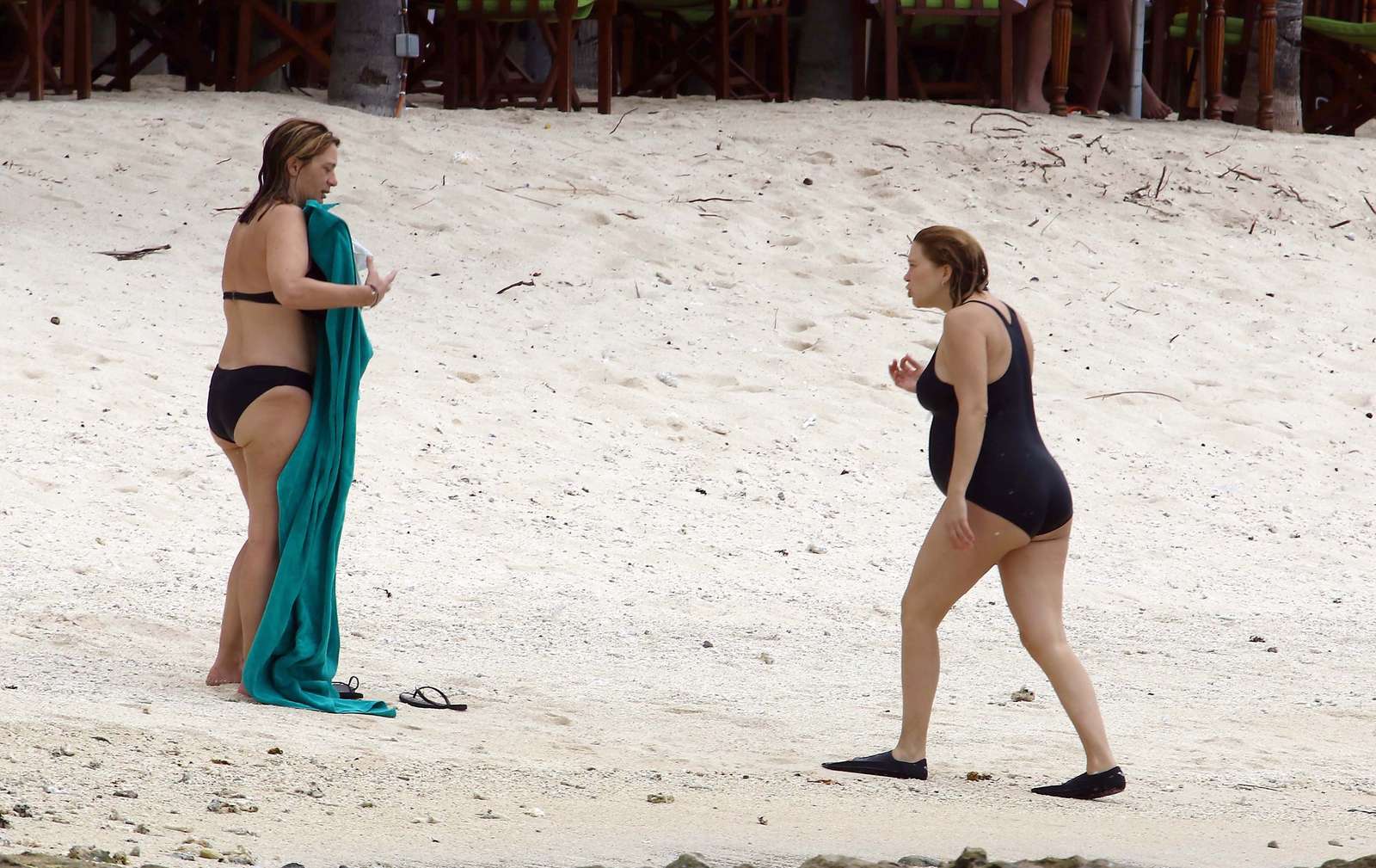 Lea Seydoux in Black Swimsuit at the beach in Mauritius. 