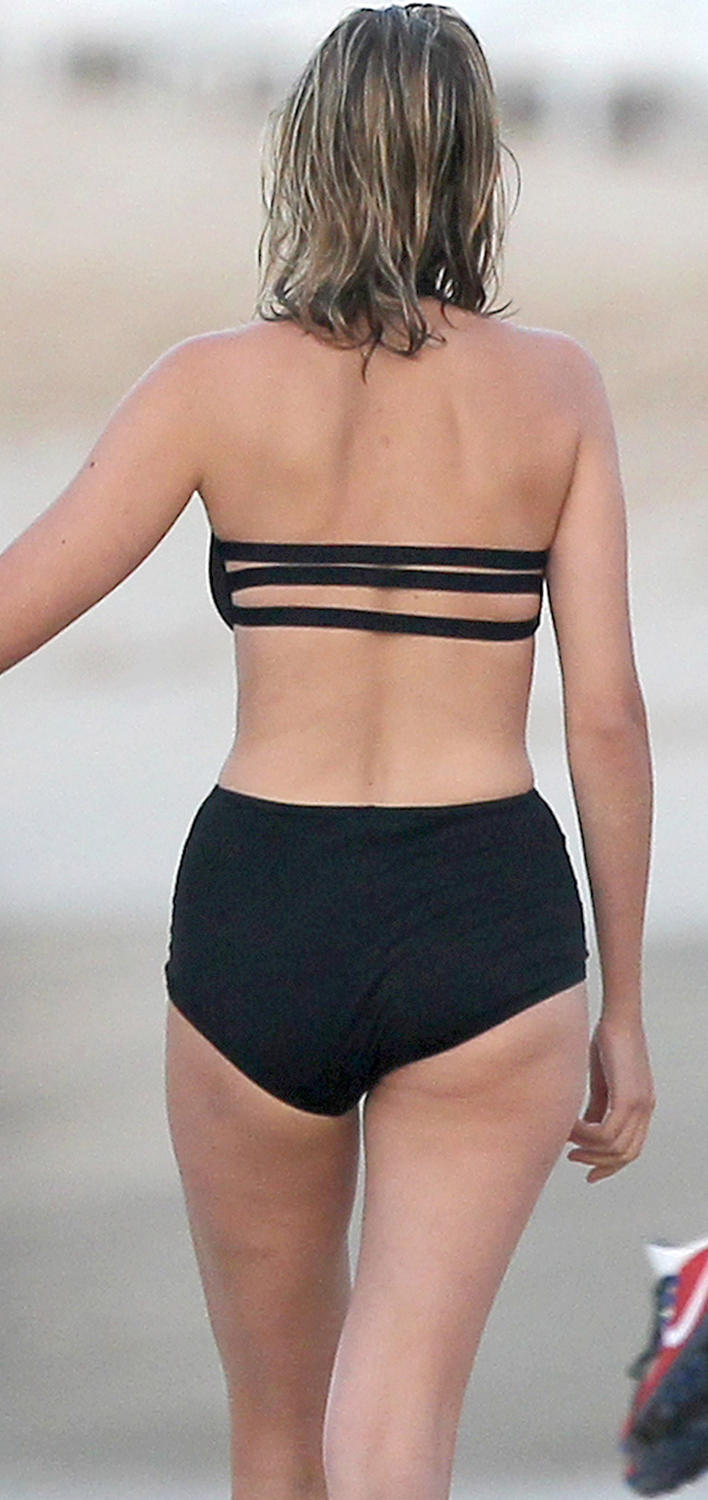 Leelee Sobieski - Wearing a black swimsuit in St. Barts. 