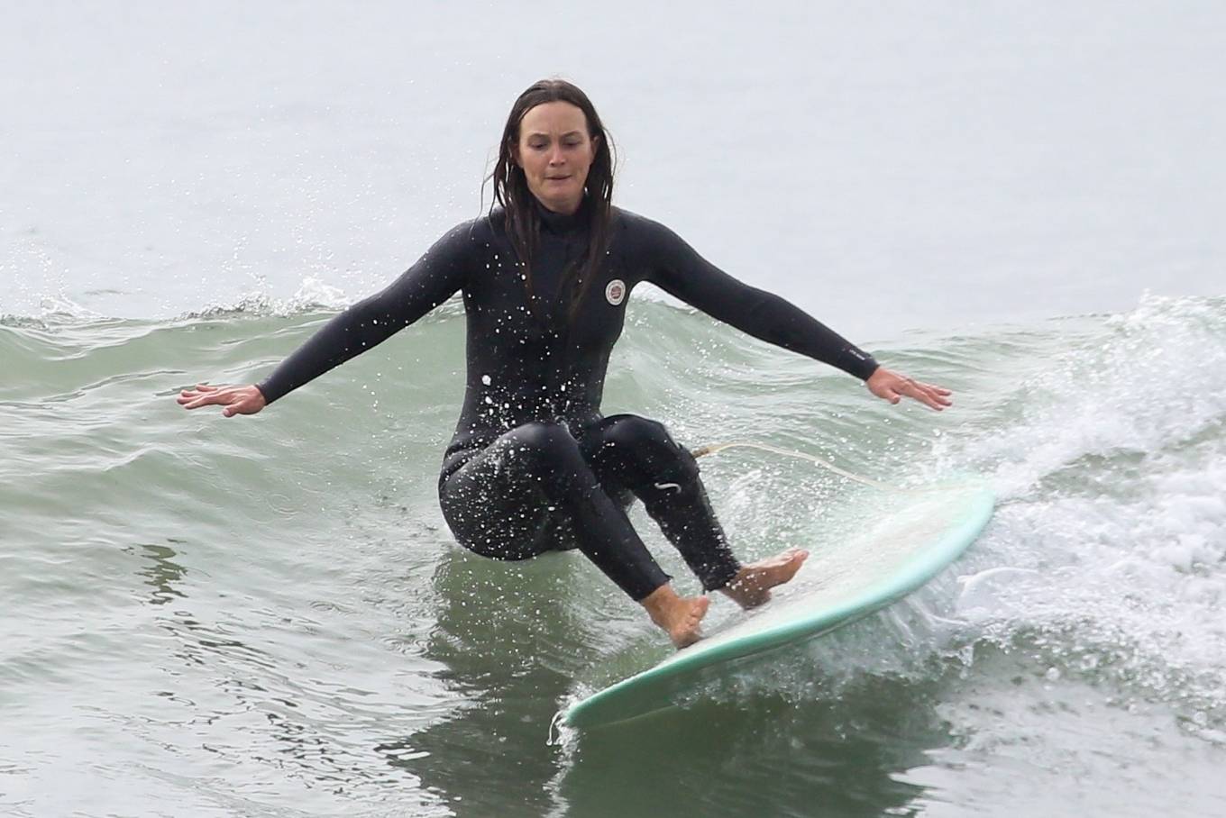 Leighton Meester - Catching waves in Malibu