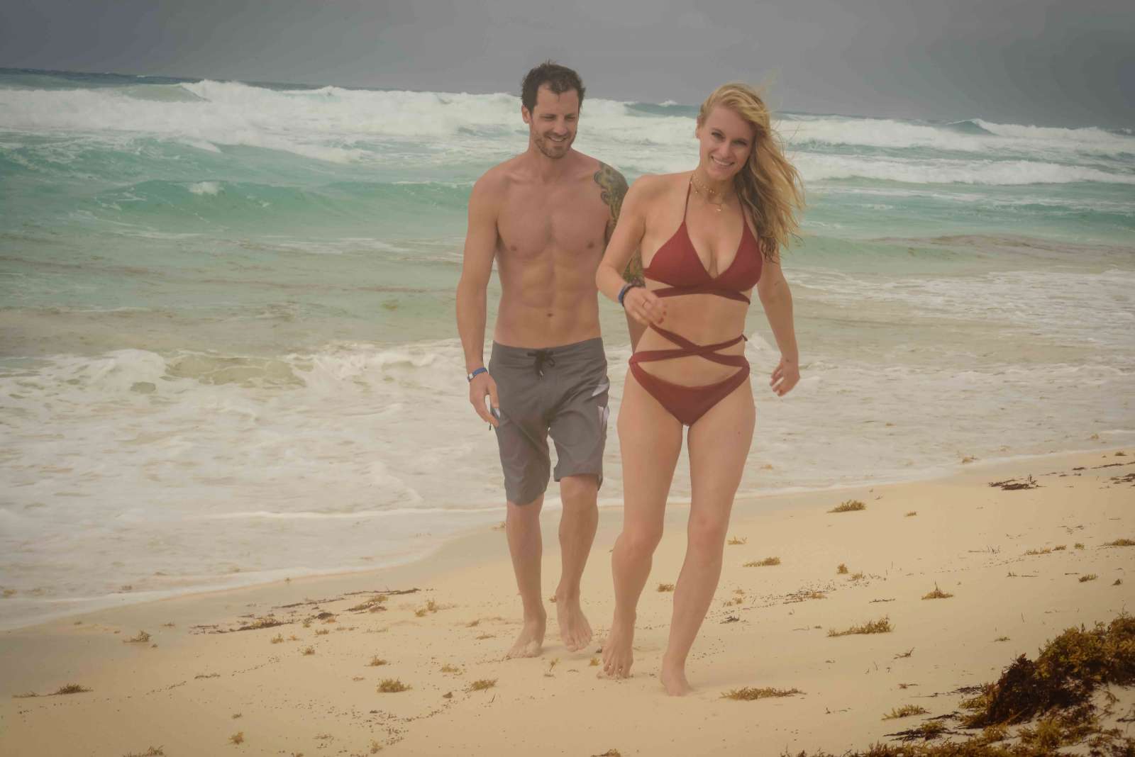 Leven Rambin in Red Bikini at the beach in Cancun. 