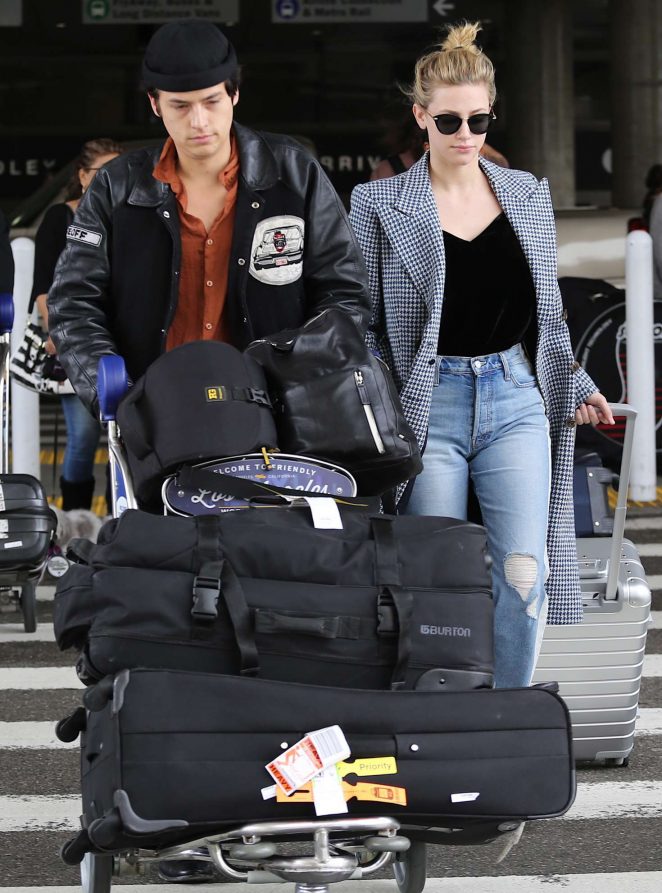 Lili Reinhart and Cole Sprouse - Arriving at LAX Airport in Los Angeles