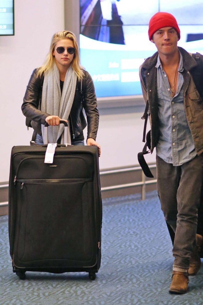 Lili Reinhart and Cole Sprouse - Arriving back in Vancouver