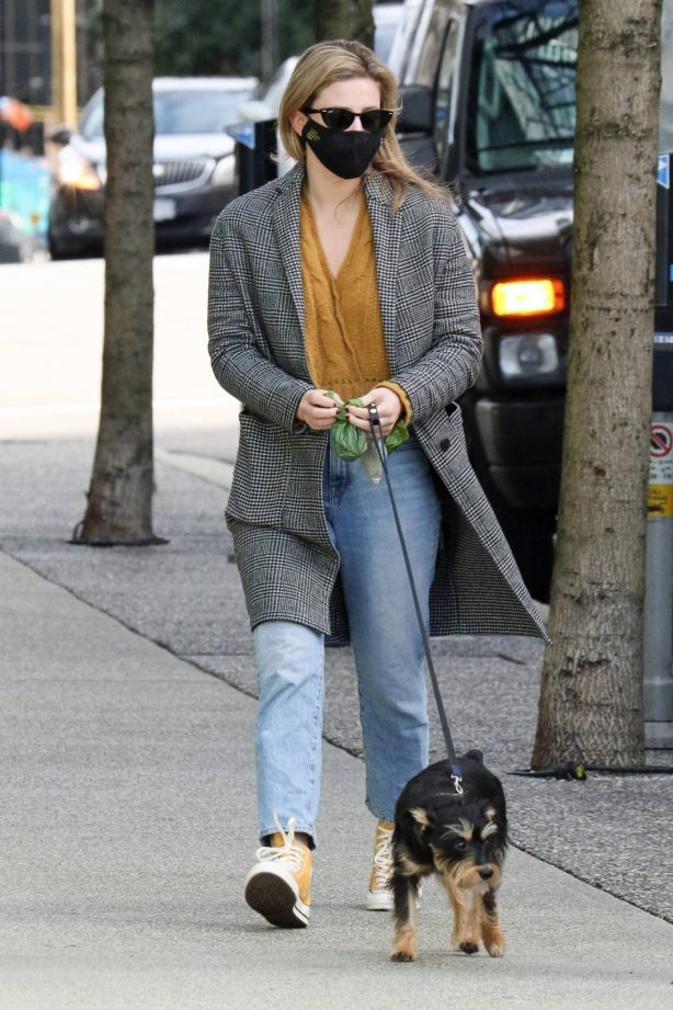 Lili Reinhart - Dons Converse sneakers as she takes dog Milo out for a walk in Vancouver