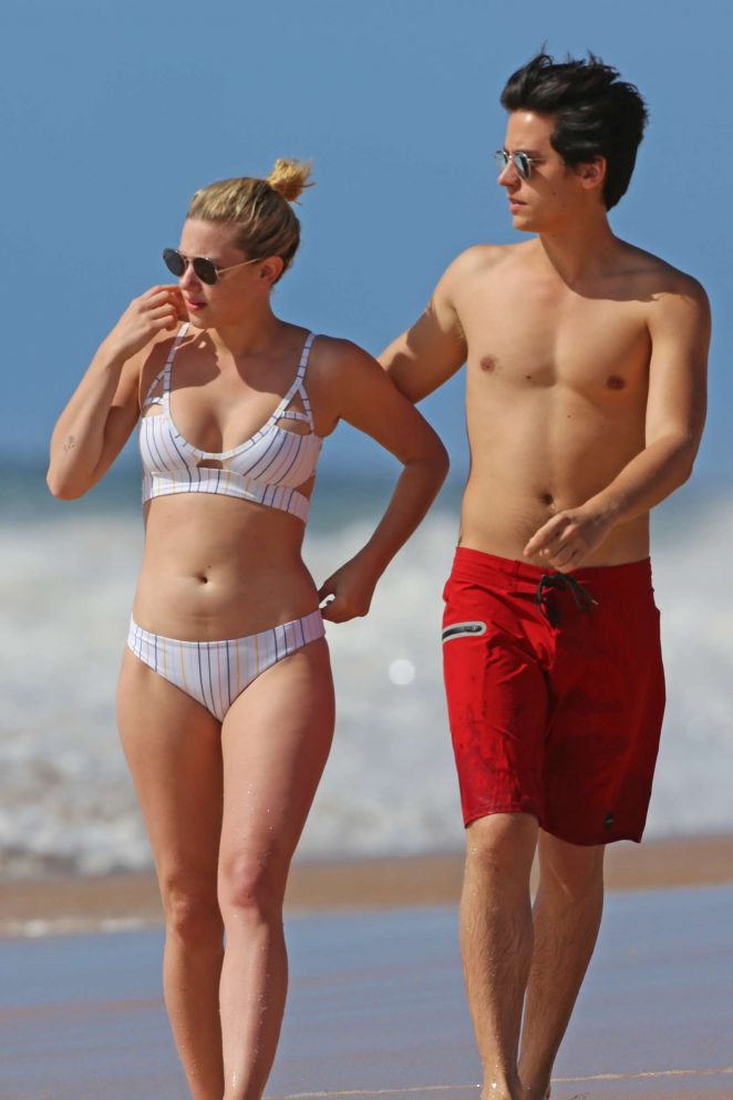 Lili Reinhart in Bikini with Cole Sprouse on the beach in Hawaii
