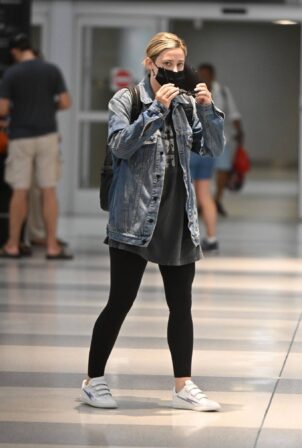 Lili Reinhart - Touch down at JFK Airport in New York