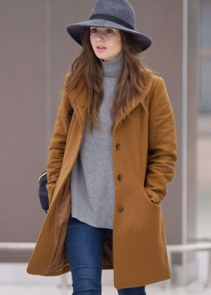 Lily Collins - Arrives at JFK Airport in New York