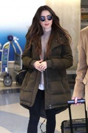 Lily Collins - Arrives at LAX in Los Angeles