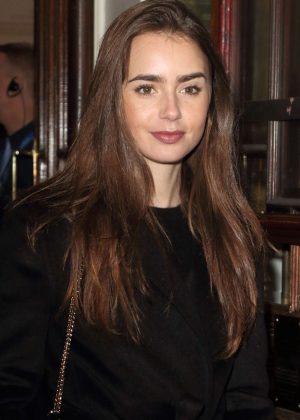 Lily Collins - Arrives at the Vaudeville Theatre in London