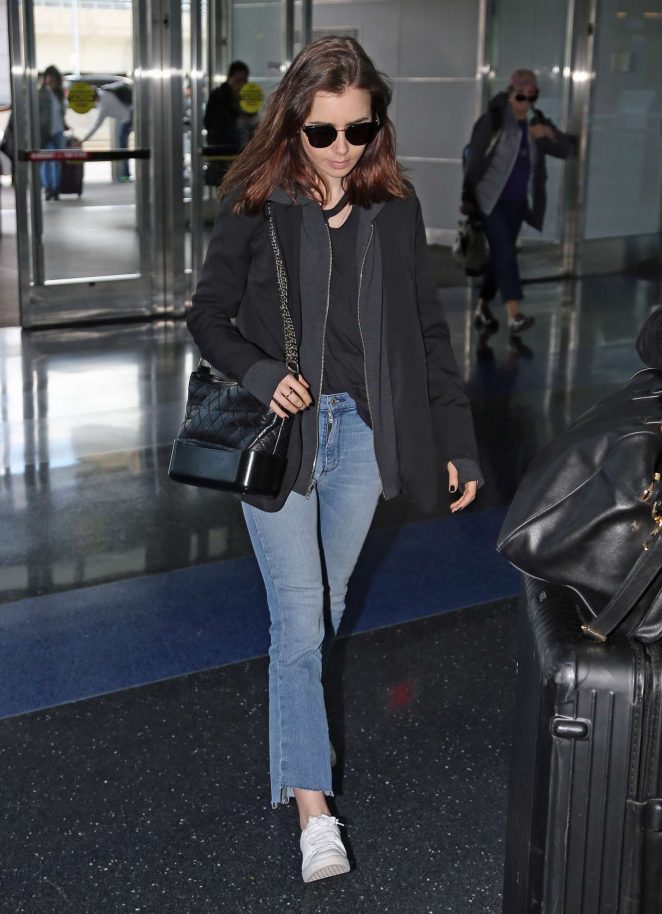Lily Collins at JFK airport in New York