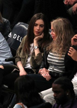 Lily Collins at the Lakers game at Staples Center in Los Angeles