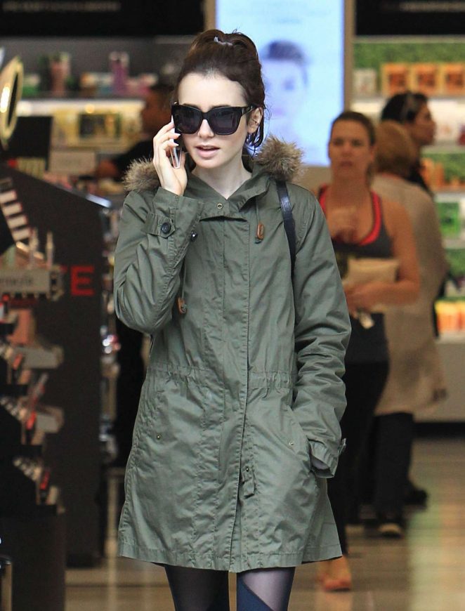 Lily Collins - Christmas shopping at The Grove in Los Angeles