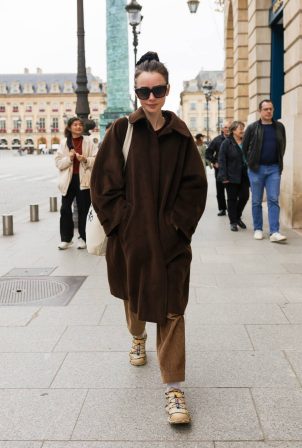 Lily Collins - Embraces casual chic in Paris