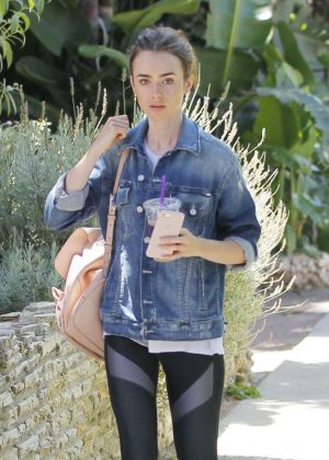 Lily Collins grabbing ice tea in Beverly Hills