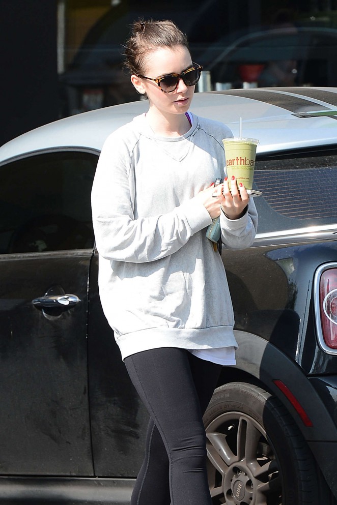 Lily Collins in Tights Grabs a Health Drink in West Hollywood