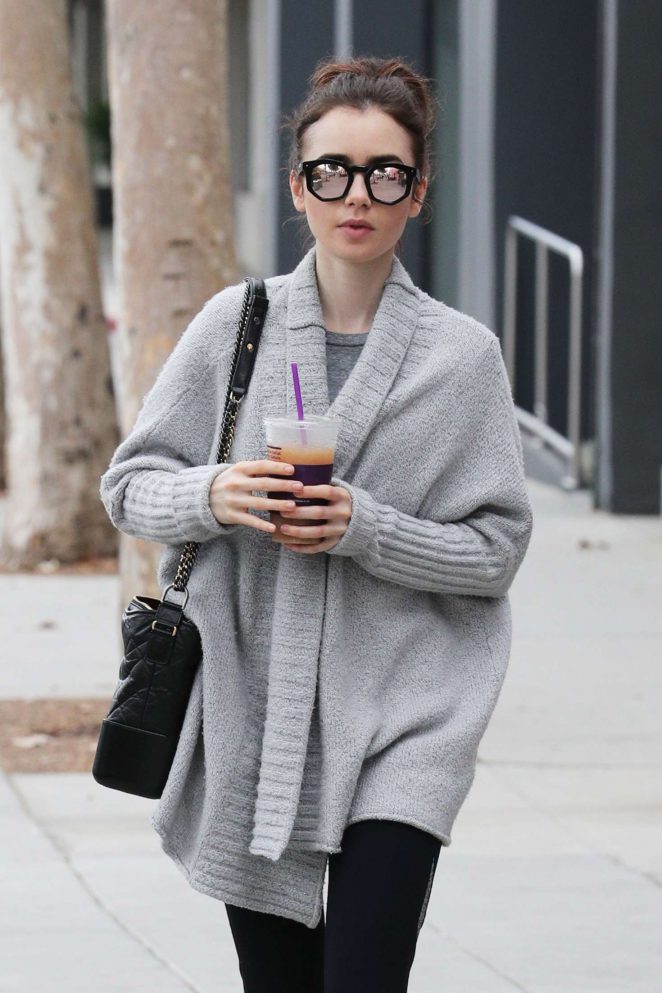 Lily Collins in a granny sweater out in Los Angeles