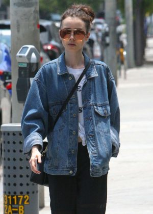 Lily Collins in a jean jacket out in West Hollywood