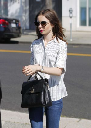 Lily Collins in Jeans Shopping in Beverly Hills