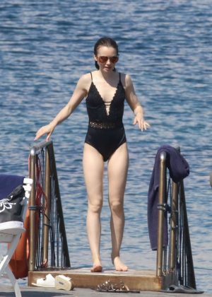 Lily Collins in Swimsuit at the beach in Italy