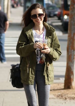 Lily Collins in Tights grabs a coffee in Los Angeles