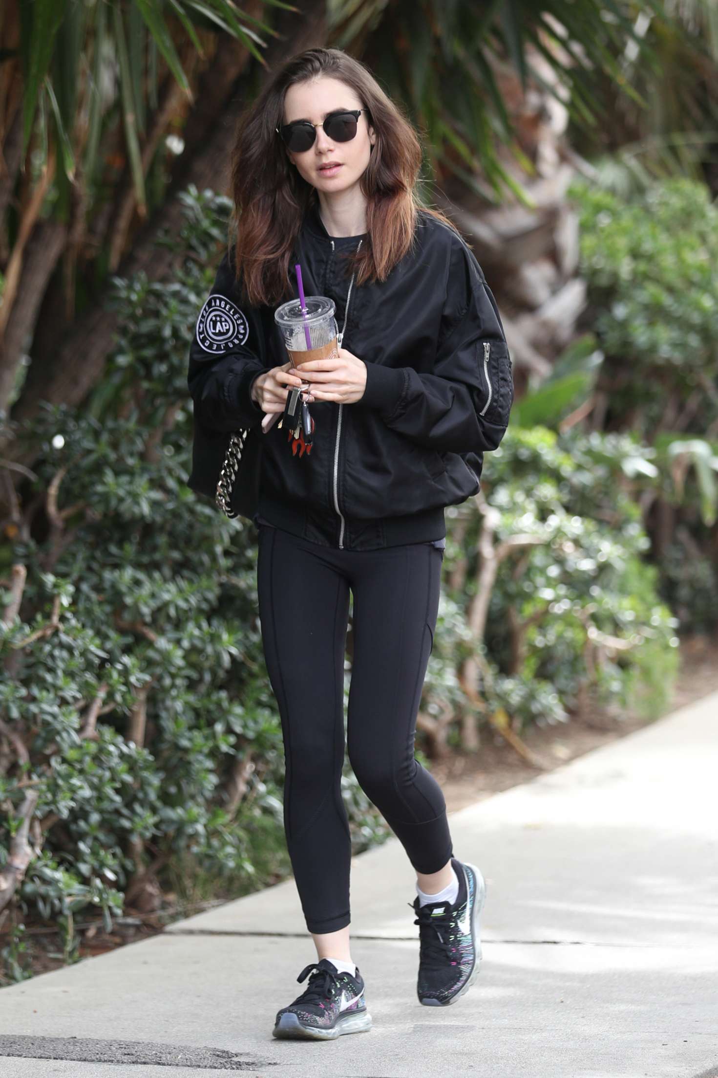 Lily Collins Just Wore The COOLEST Leggings