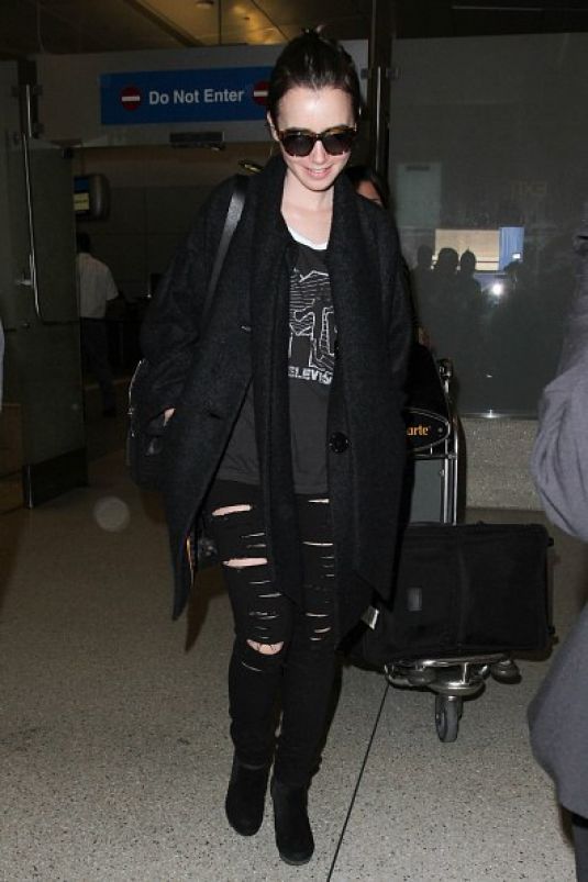 Lily Collins - LAX Airport in Los Angeles