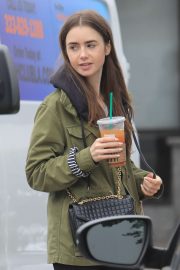 Lily Collins - Leaves Starbucks in West Hollywood