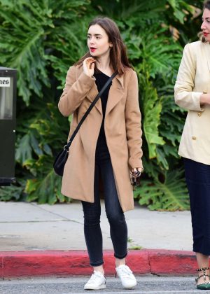 Lily Collins Leaving Dan Tana's restaurant in Los Angeles