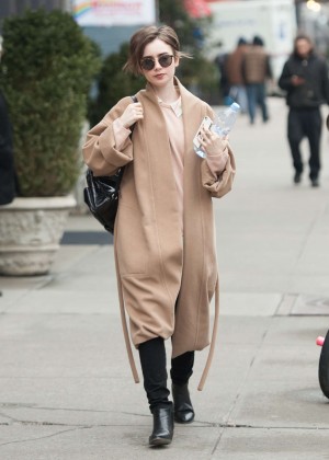 Lily Collins in Long Coat Out in NYC