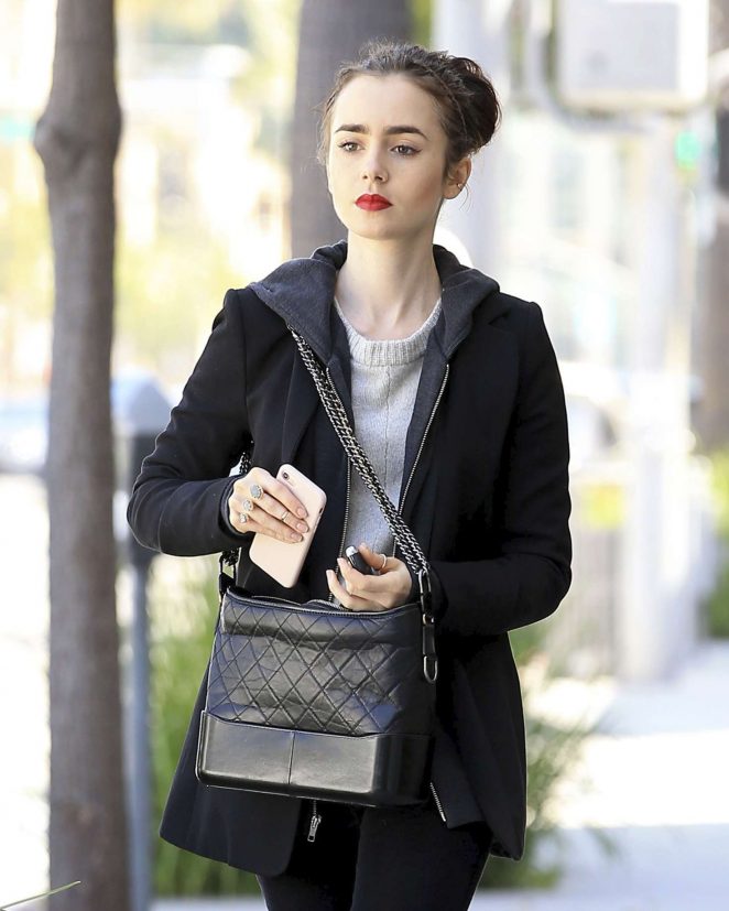 Lily Collins walking out in Beverly Hills