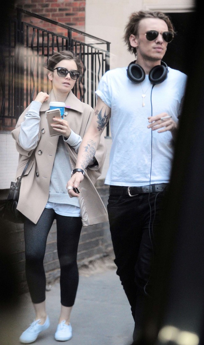 Lily Collins with Jamie Campbell Bower Out in London