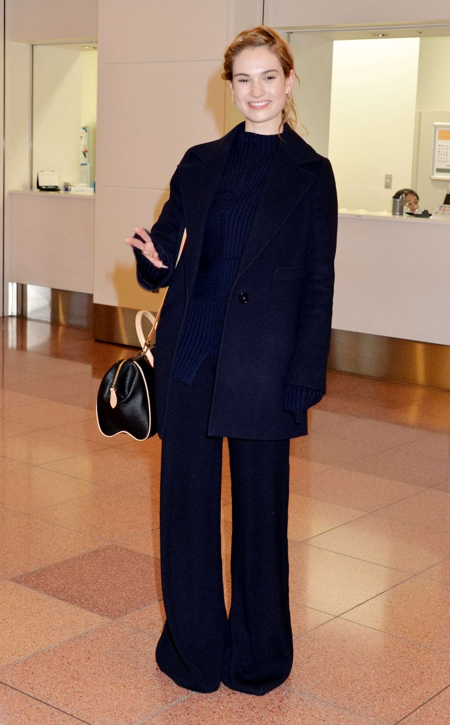 Lily James - Arriving at Haneda International Airport in Tokyo